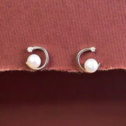 Elegant Pearl Twist Studs